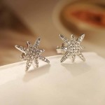 FLORA BRINCO FOLHEADO A OURO 18K ESTRELA ZIRCÔNIA CRAVEJADA - Imagem 3
